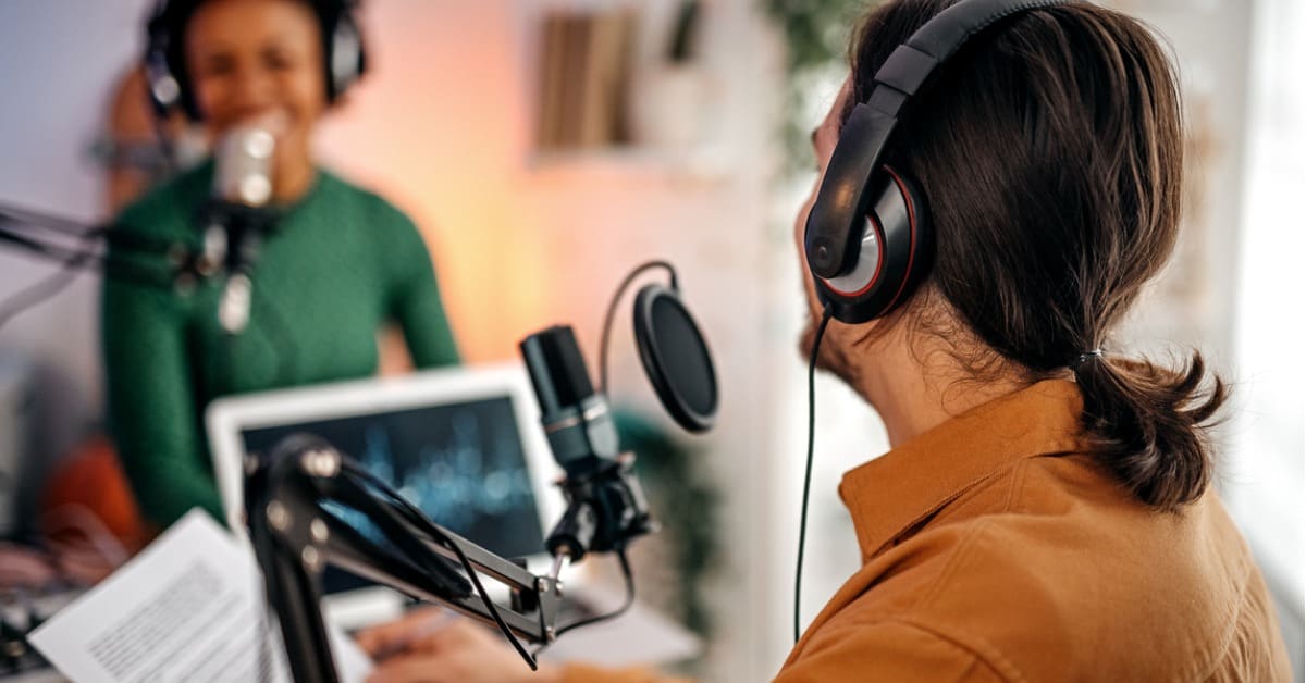 A person in the middle of recording a podcast.