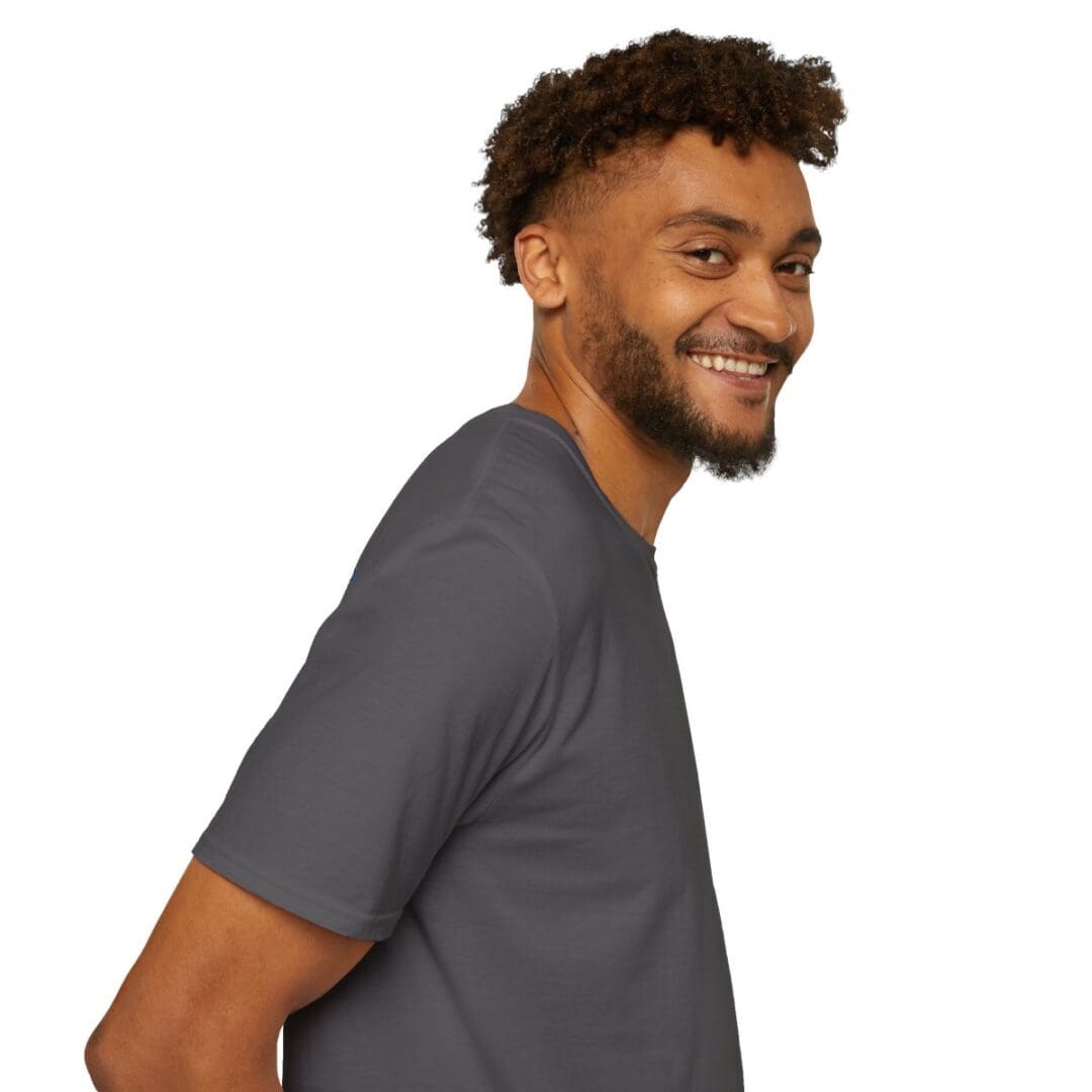 Smiling man in a charcoal t-shirt.