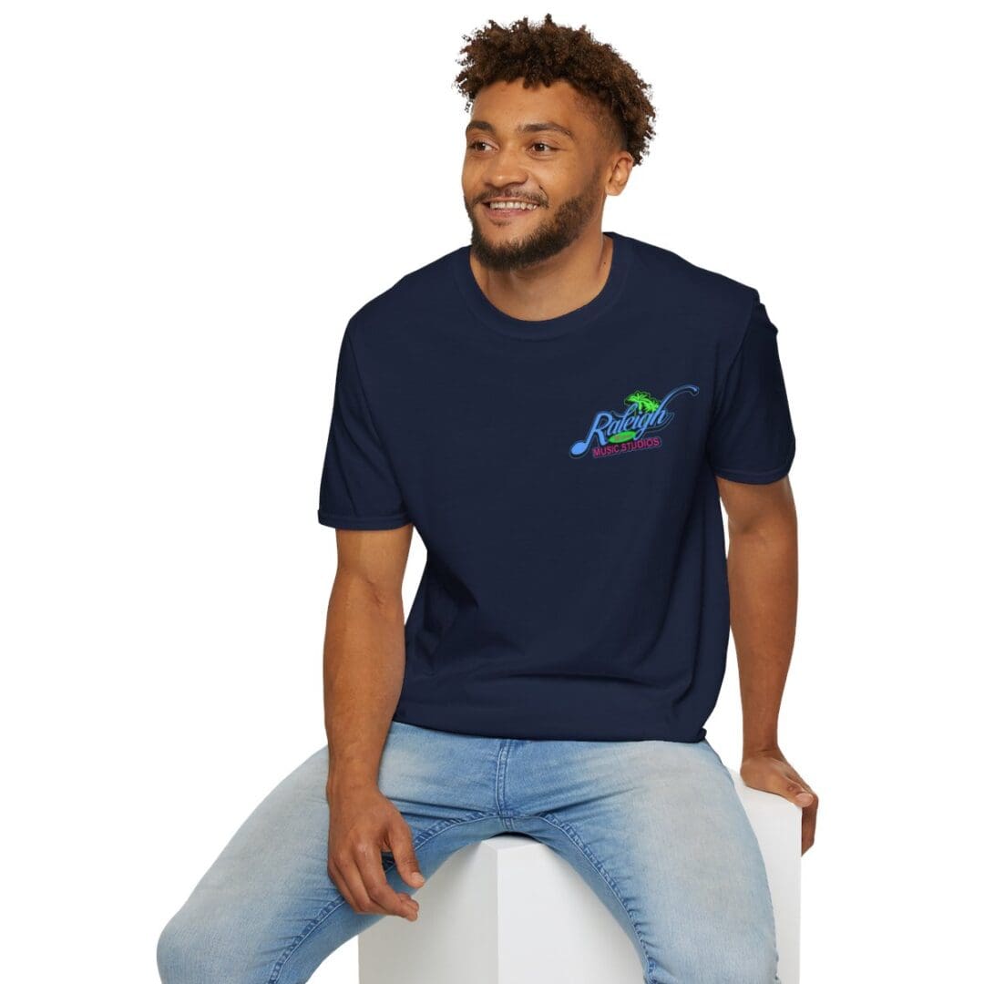 Man in Raleigh Music Studios T-shirt.