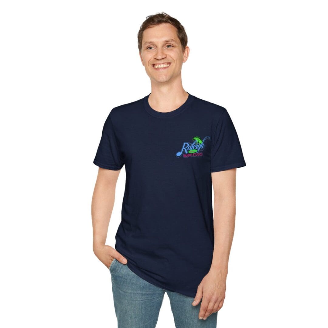 Man in navy Raleigh Music Studio tee.