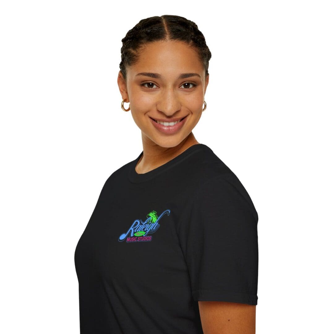 Woman in black Raleigh Music Studios shirt.