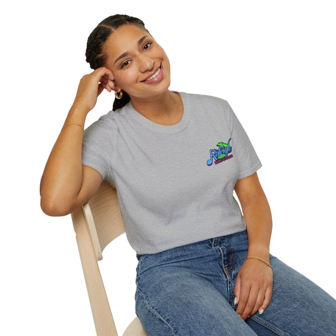 Woman in gray Raleigh t-shirt.