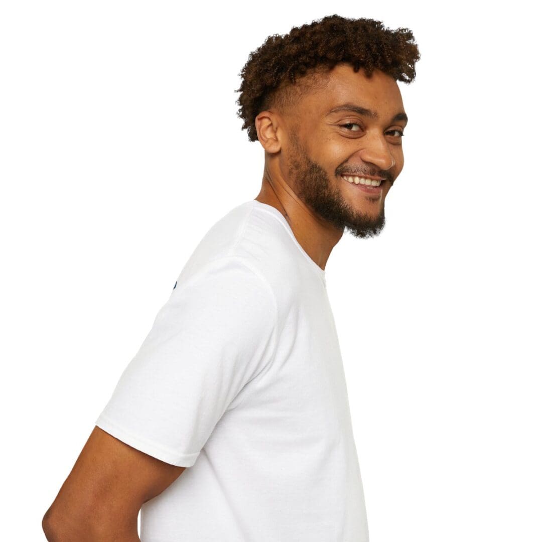 Smiling man in white t-shirt.