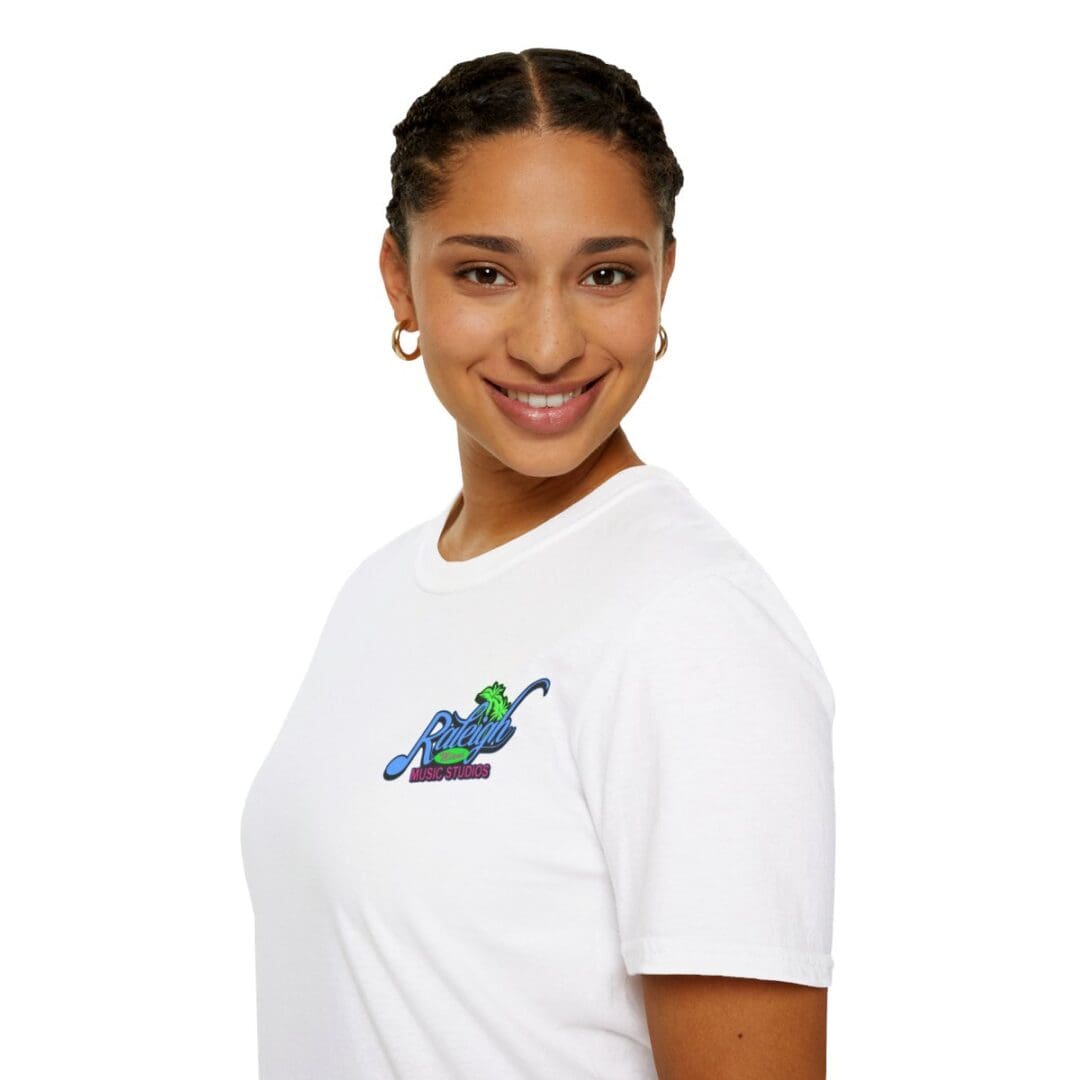 Woman smiling in white graphic tee.