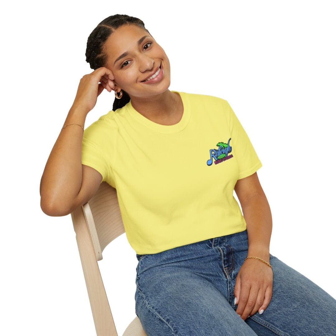 Woman in yellow Raleigh shirt.