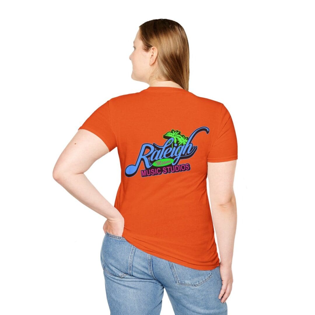 Woman in orange Raleigh Music Studios shirt.