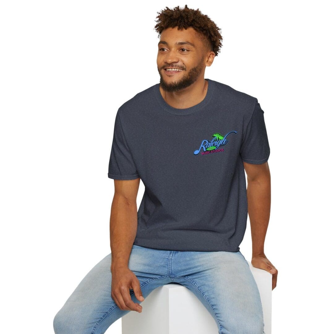 Man in Raleigh Music Studios T-shirt.