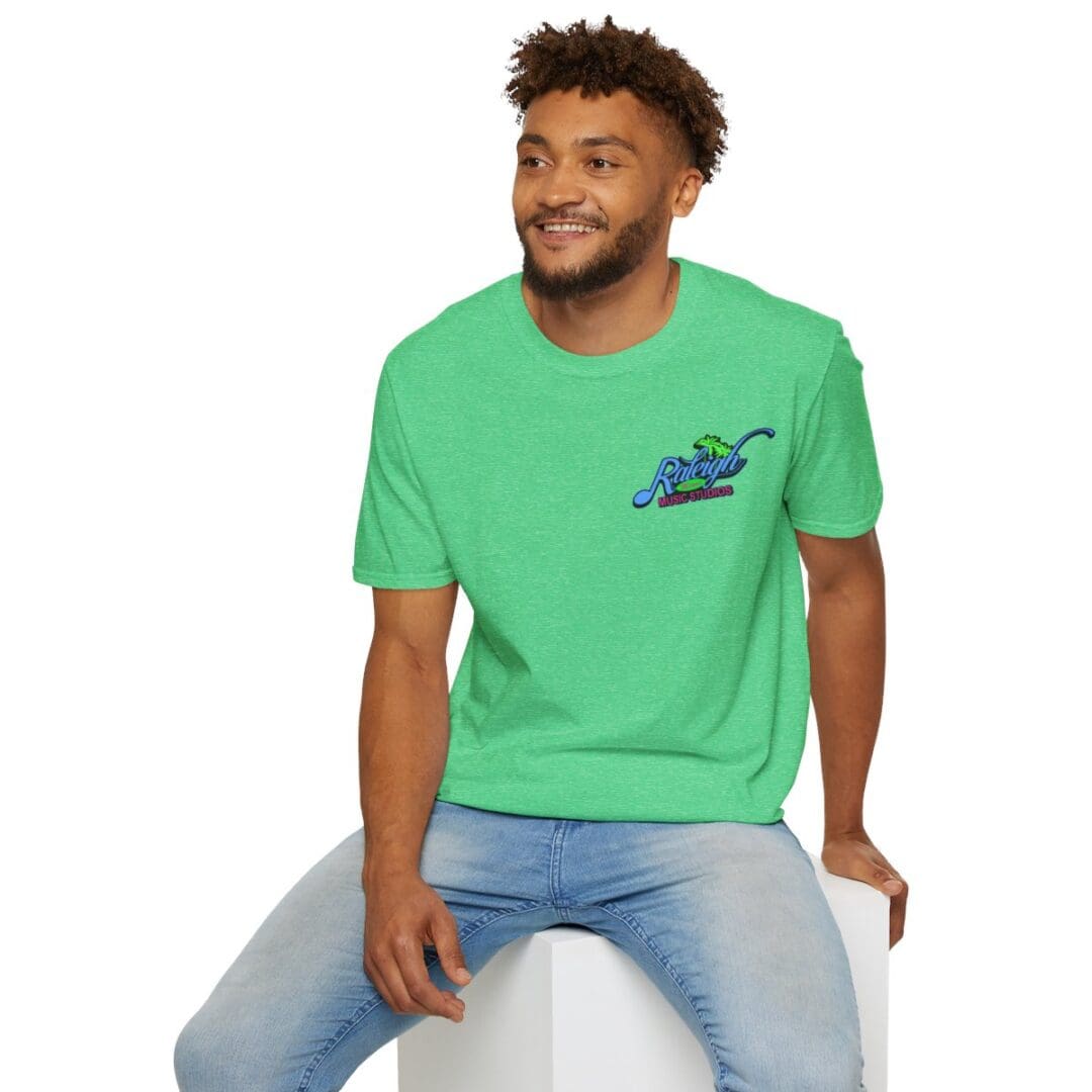 Man in green Raleigh Music Studios tee.