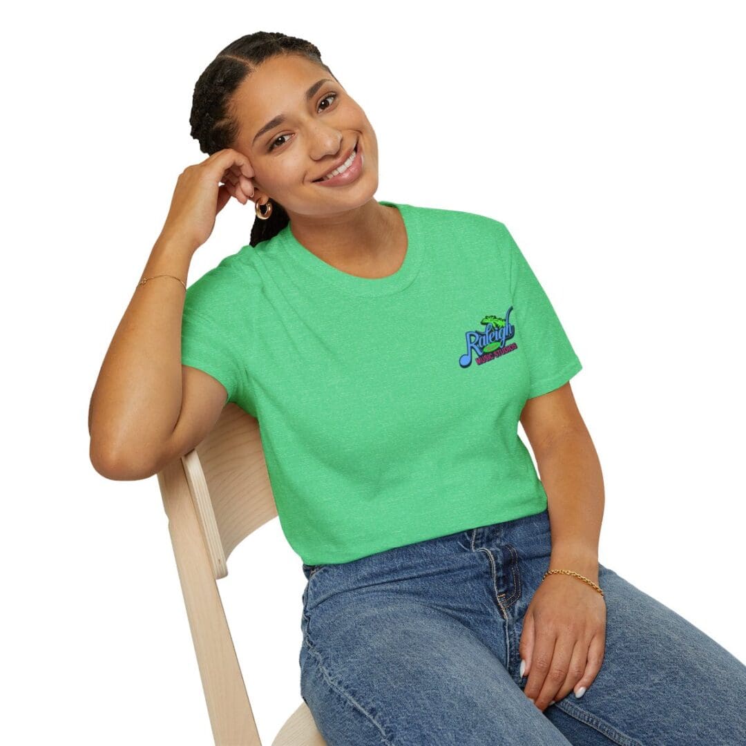 Woman in green Raleigh Music tee.
