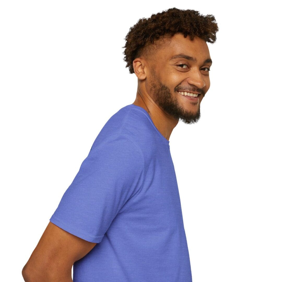 Smiling man in a purple t-shirt.