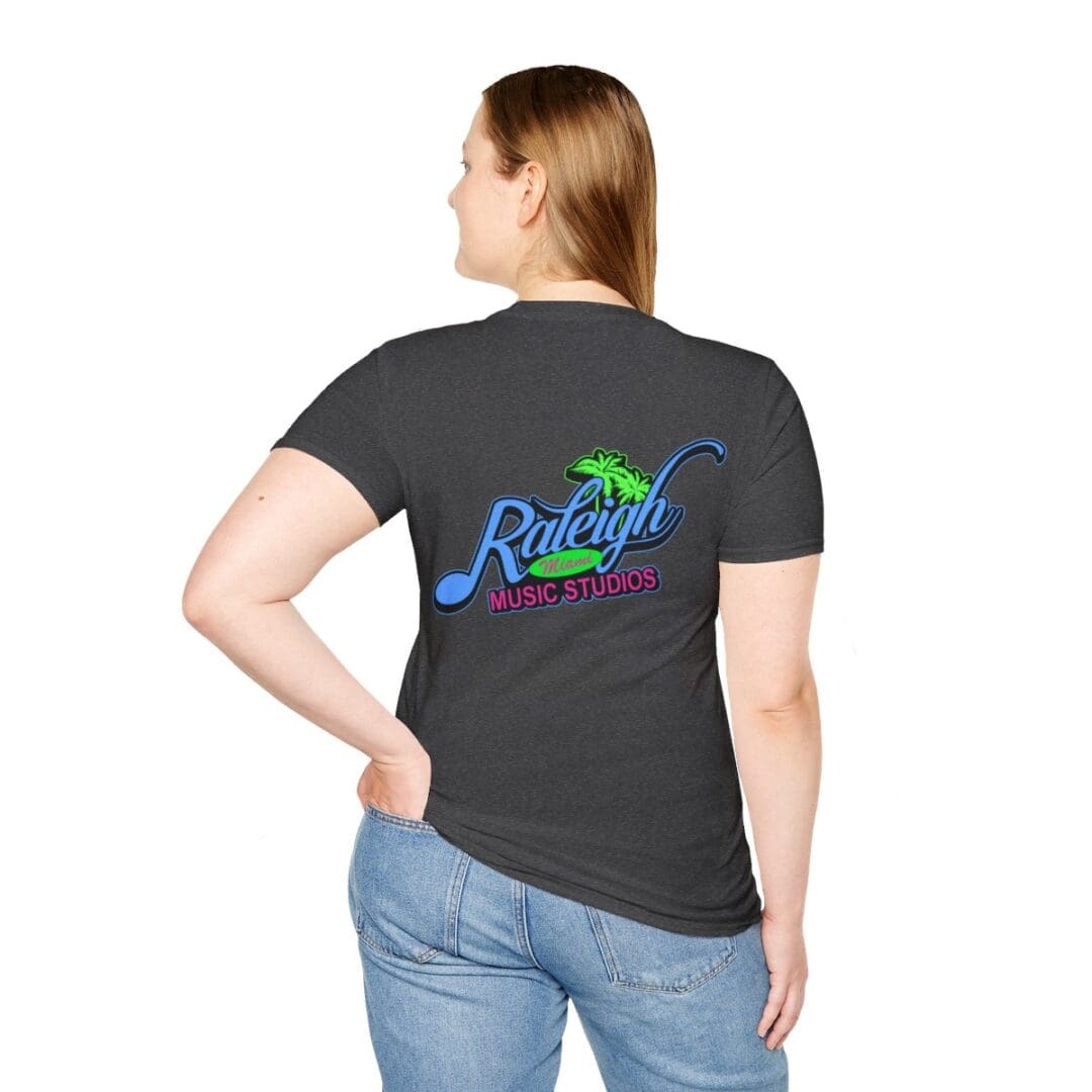 Here's an 8-word alt tag for the image: Woman's back, dark gray Raleigh Music Studios T-shirt.