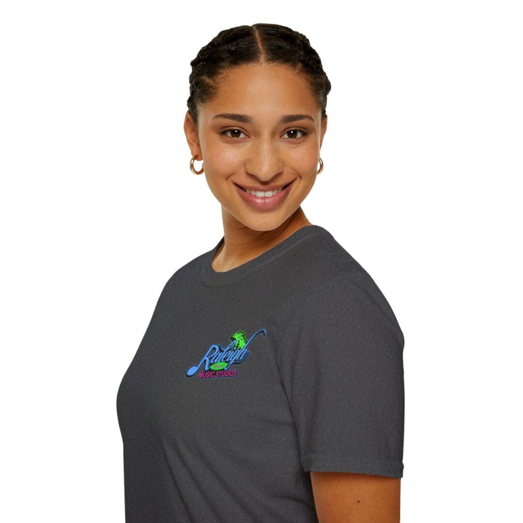 Woman in dark gray Raleigh Music Studios shirt.