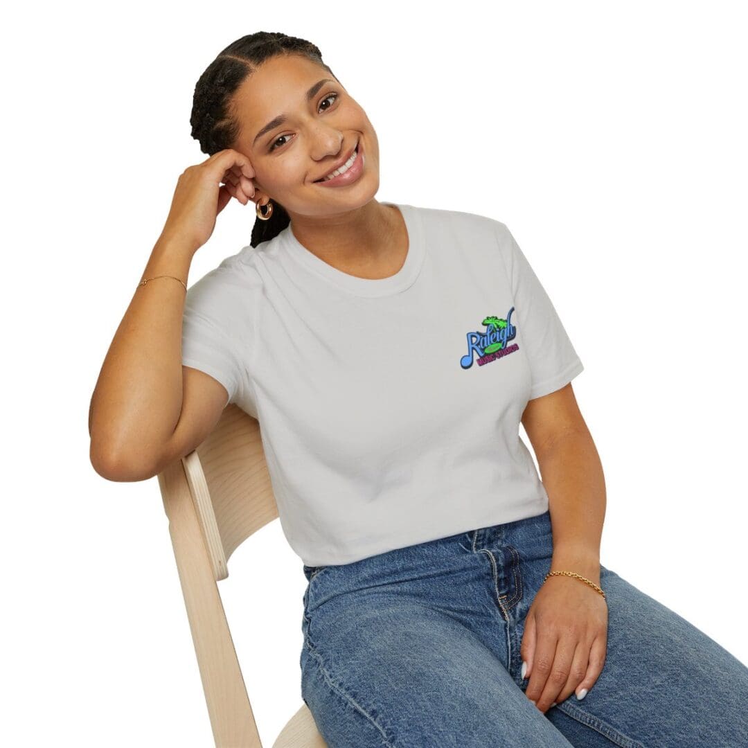 Woman in white Raleigh tee shirt.