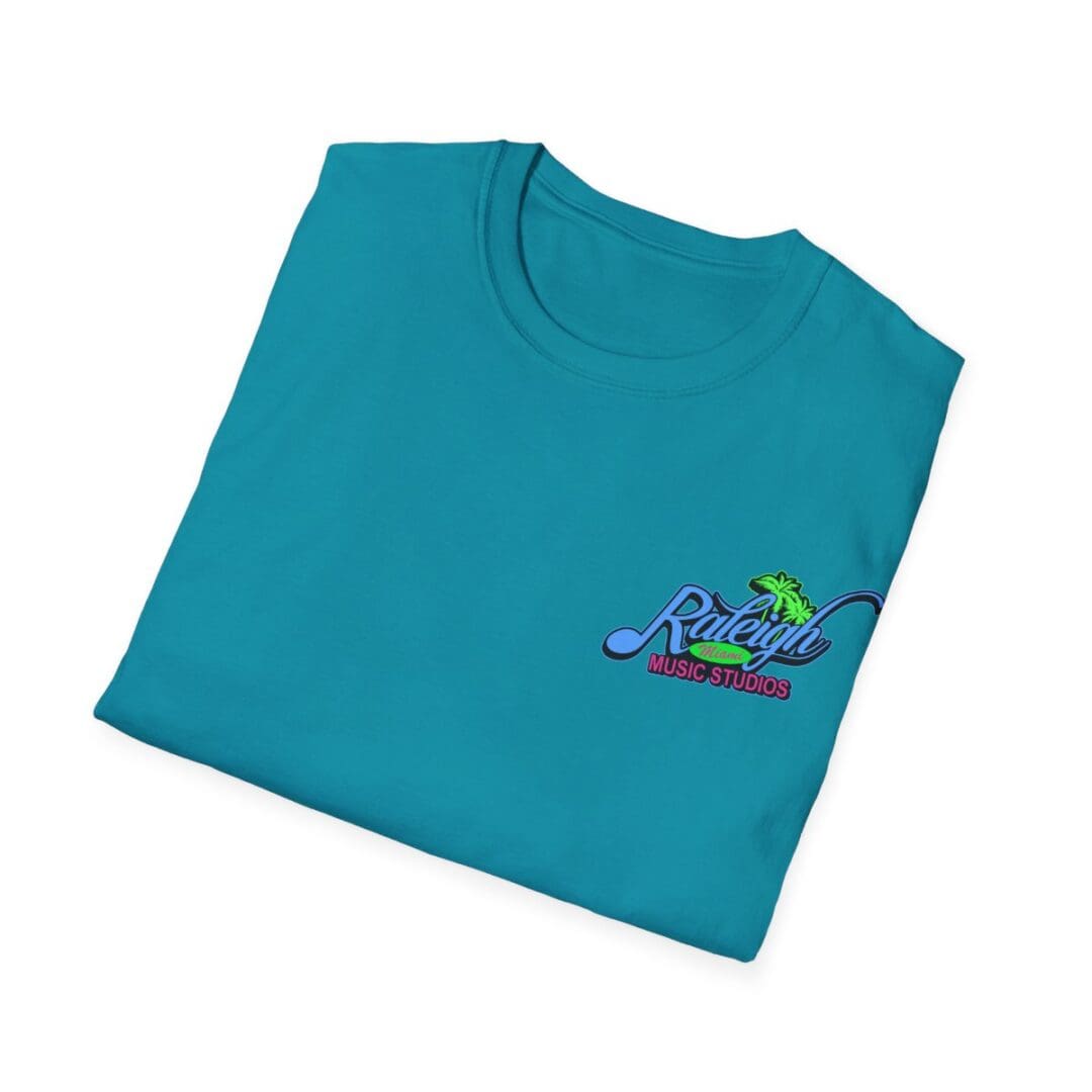 Folded teal Raleigh Music Studios tee.