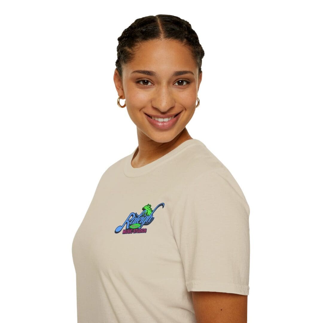 Woman in beige t-shirt with logo.