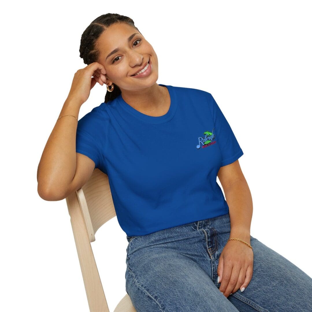 Woman in blue shirt with logo.