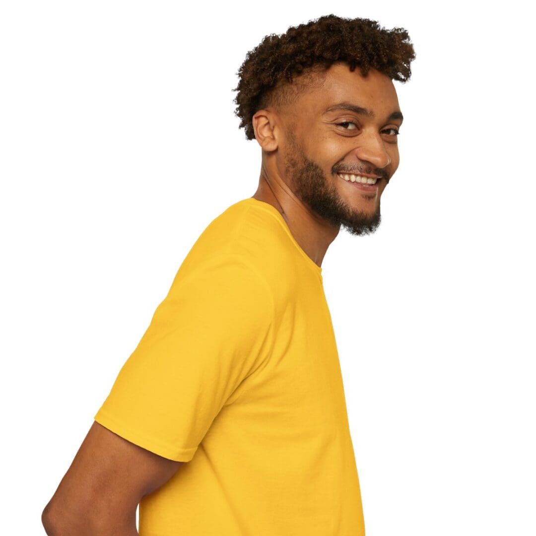 Smiling man in yellow t-shirt.
