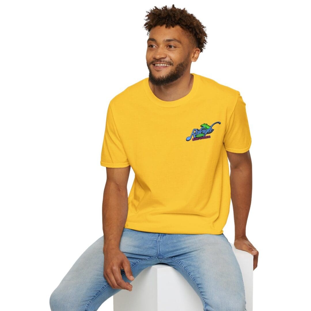 Man in yellow shirt with logo.