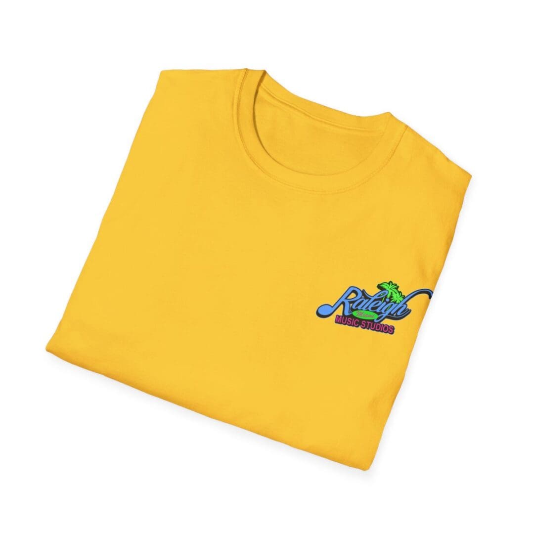 Folded yellow Raleigh Music Studios shirt.
