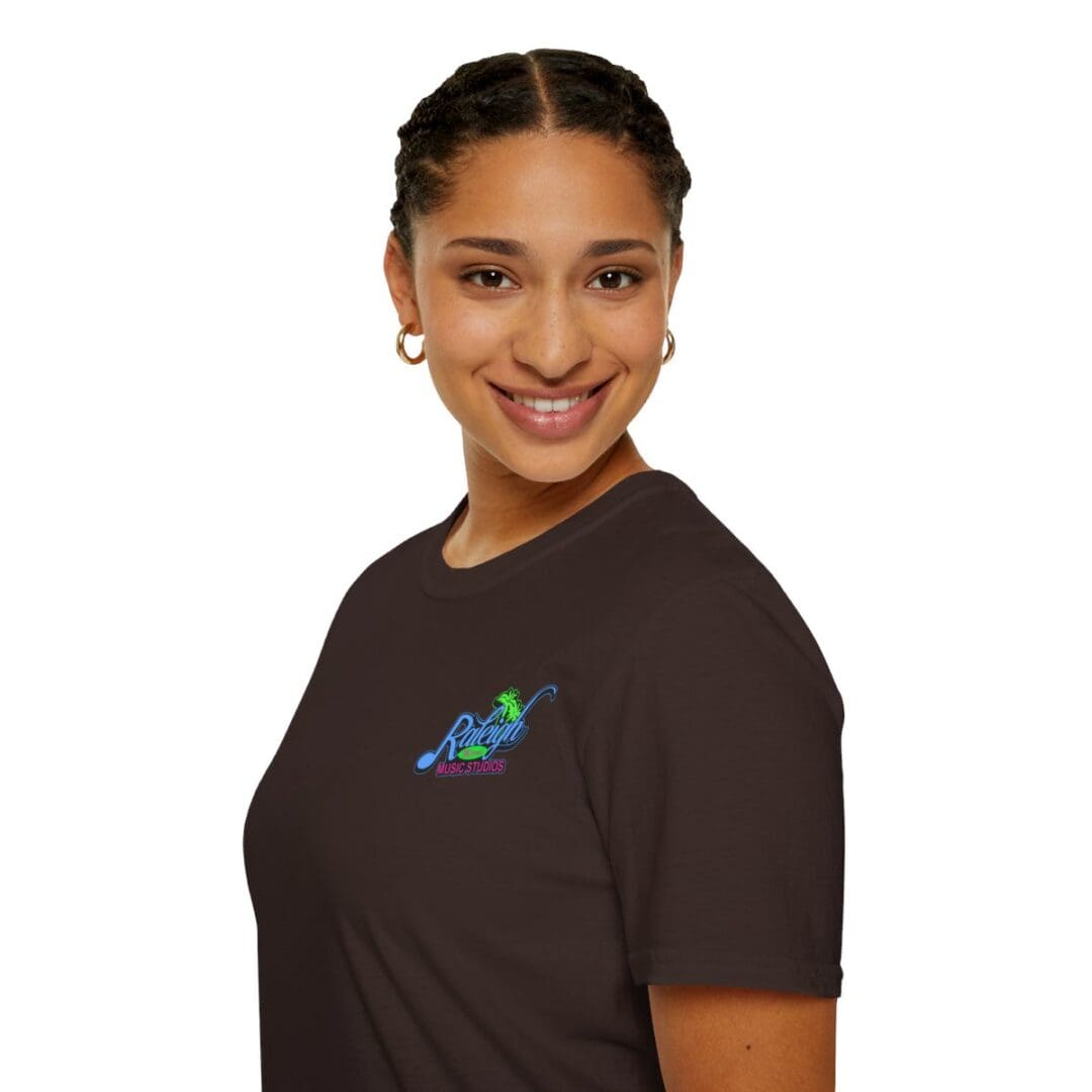 Woman wearing brown Ranchito Music Studios tee.