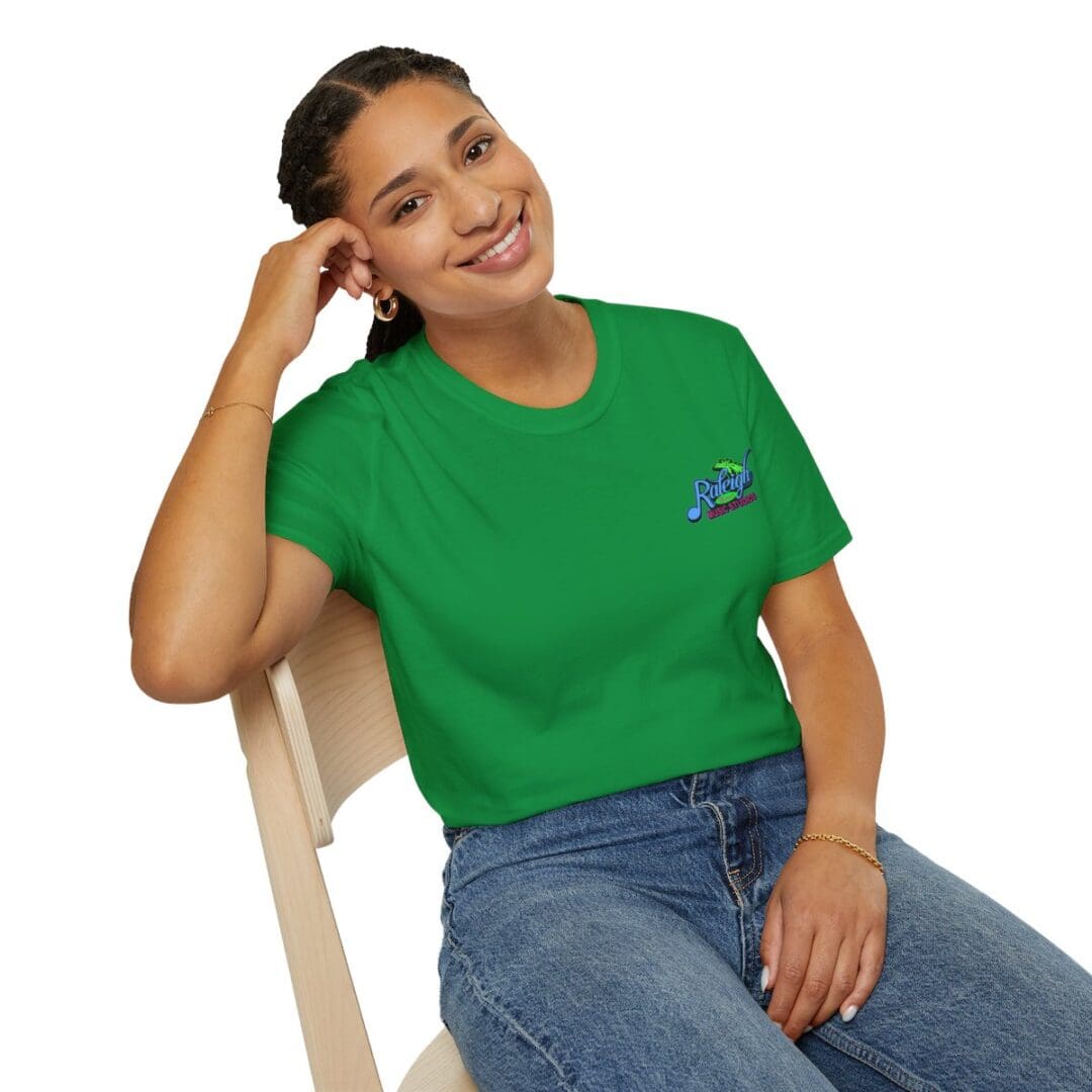 Woman in green shirt with logo.