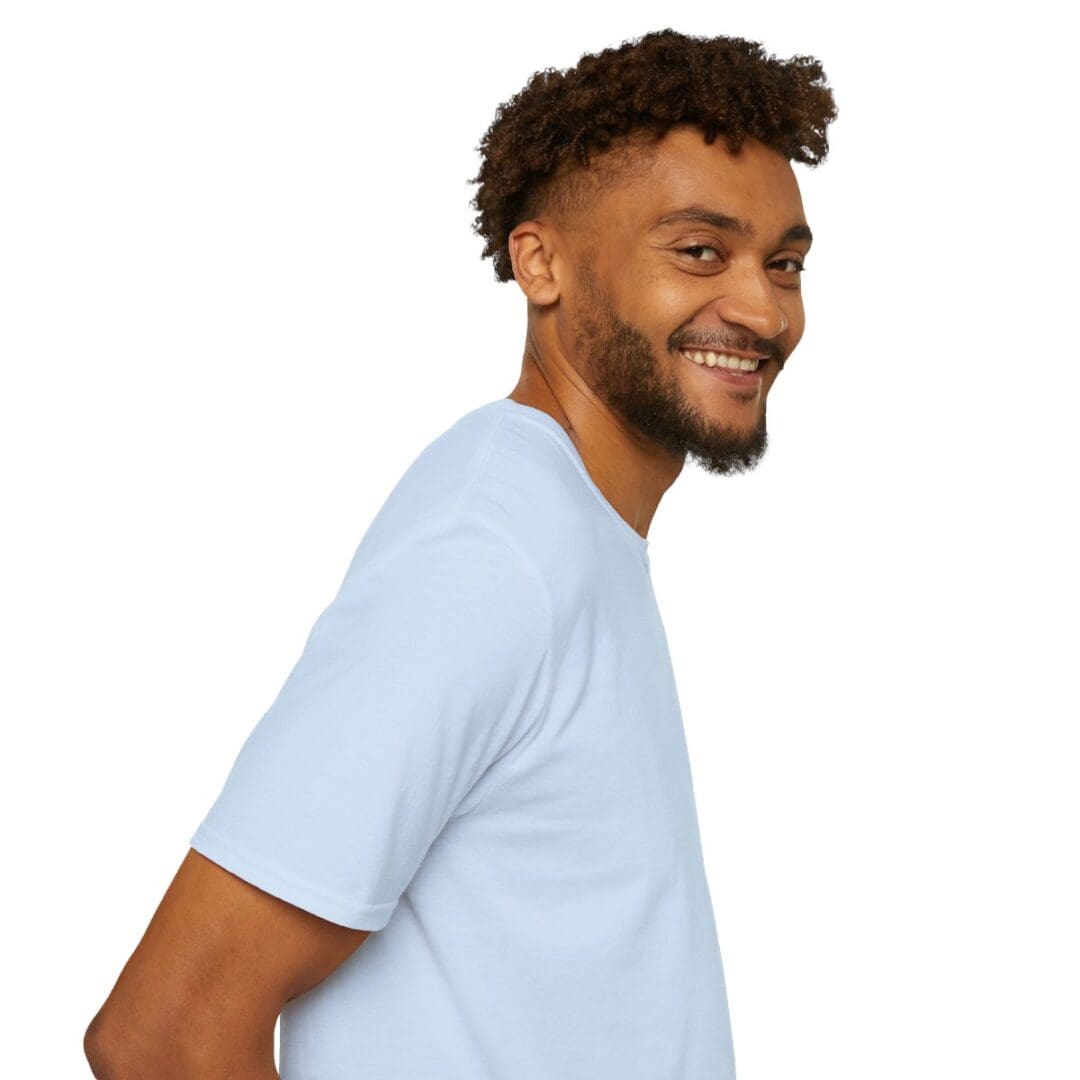 Smiling man in light blue t-shirt.