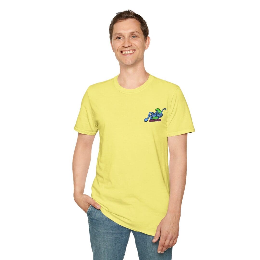 Man in yellow shirt with Raleigh logo.