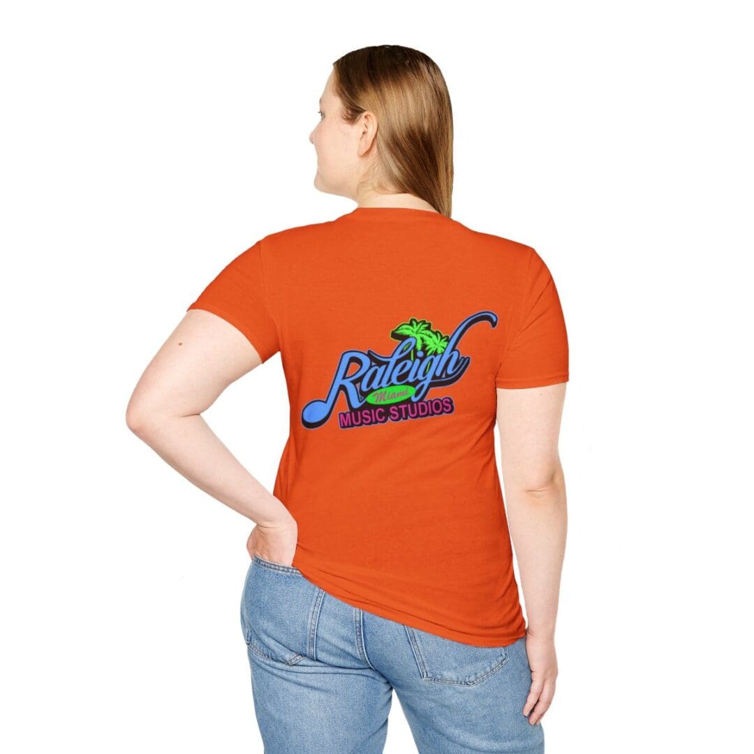 Woman in orange Raleigh Music Studios shirt.