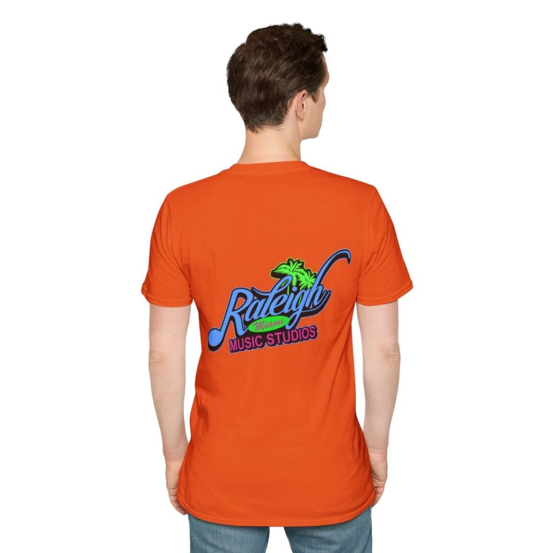 Orange t-shirt with Raleigh Music Studios logo.