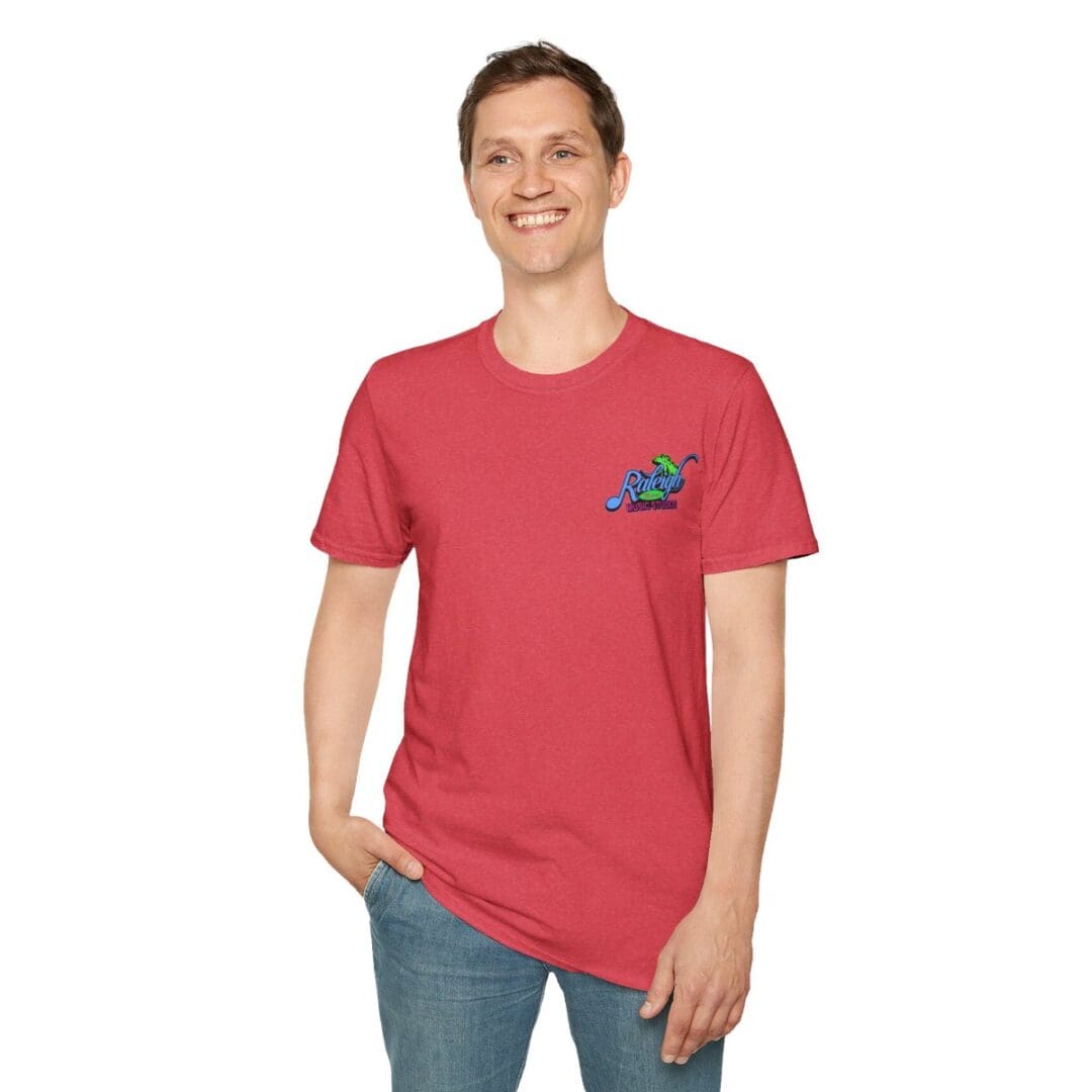 Man in red shirt with Raleigh logo.
