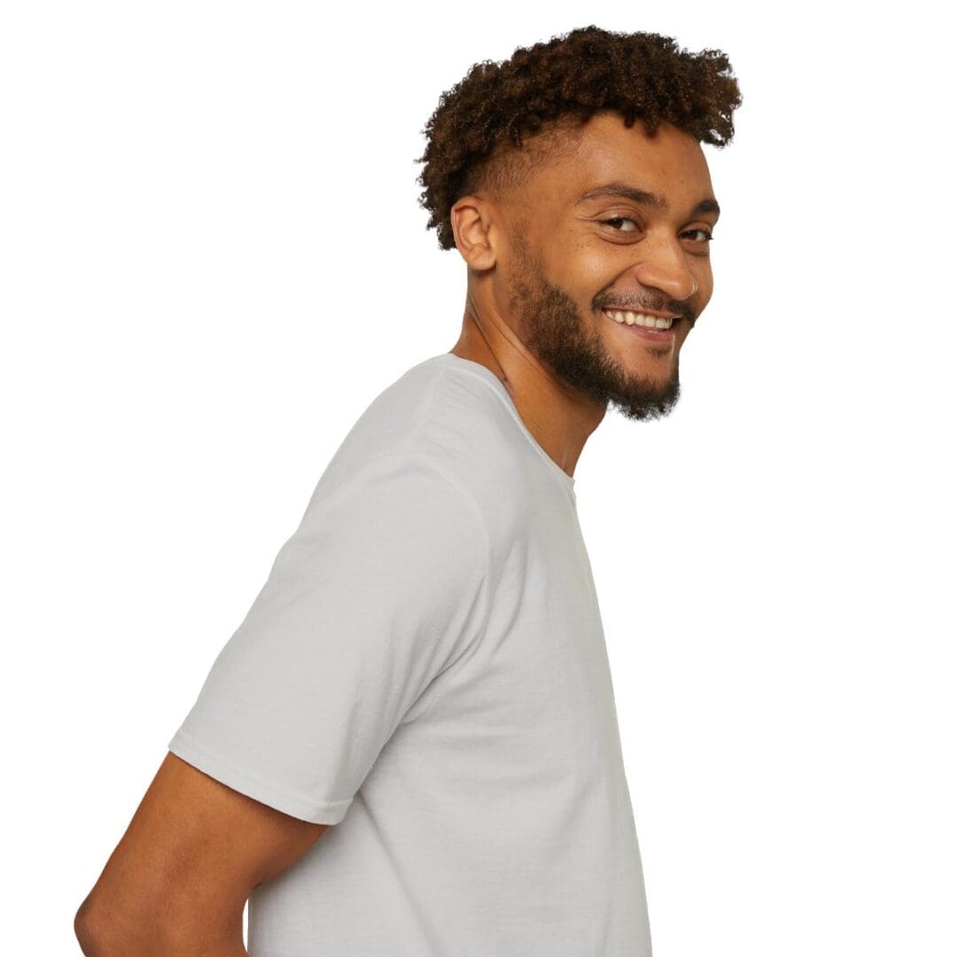 Smiling man in light gray t-shirt.