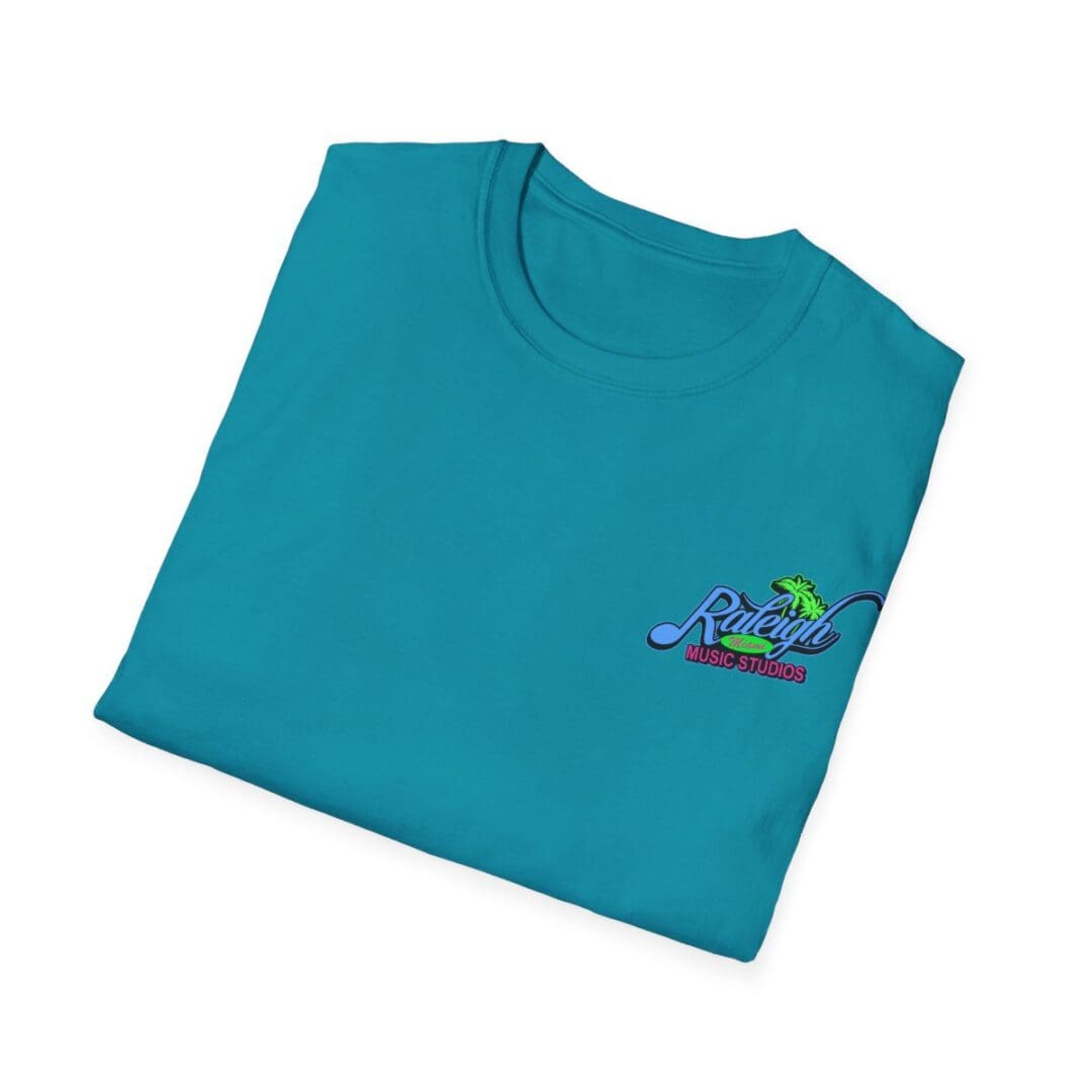 Folded teal Raleigh Music Studios tee.