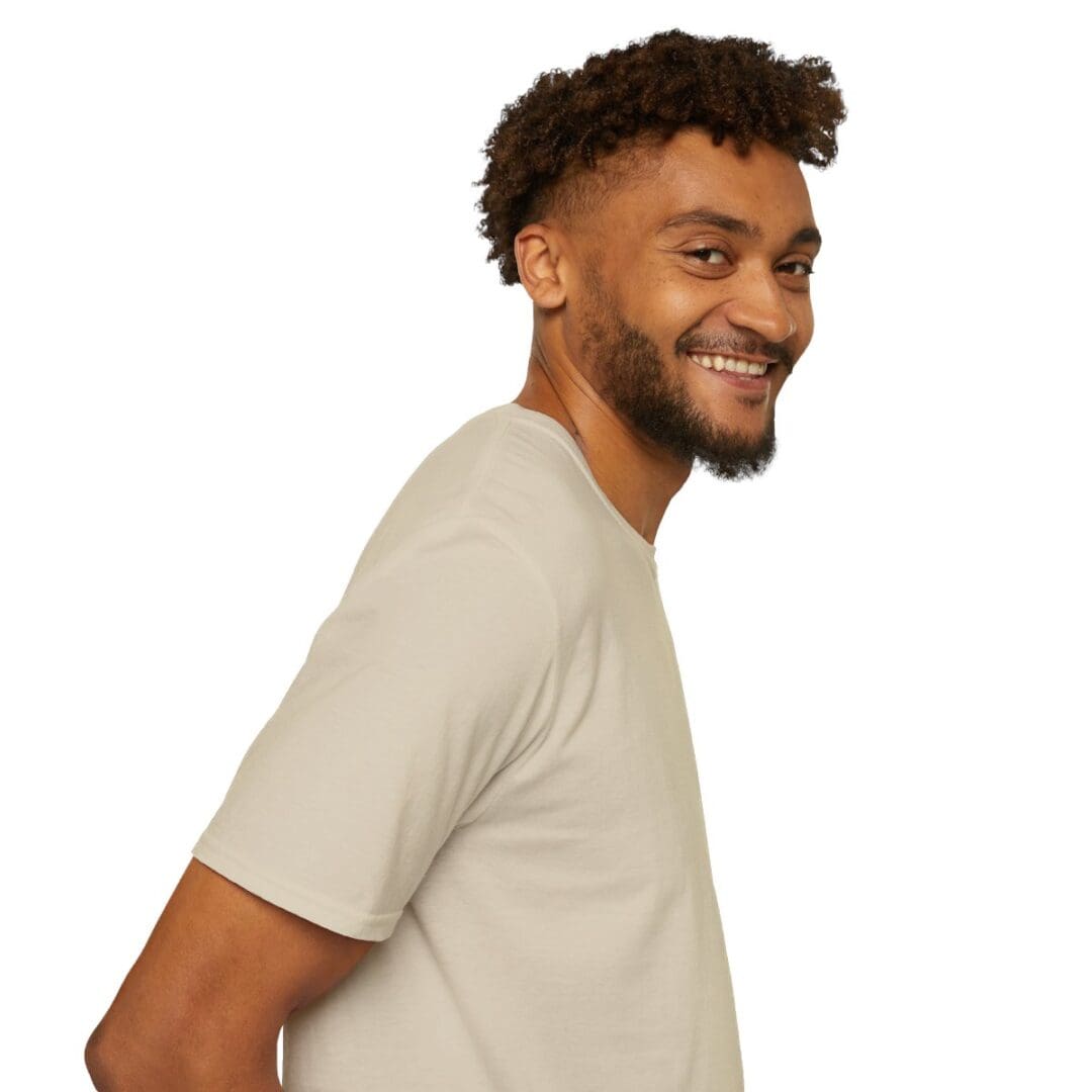 Smiling man in beige t-shirt.