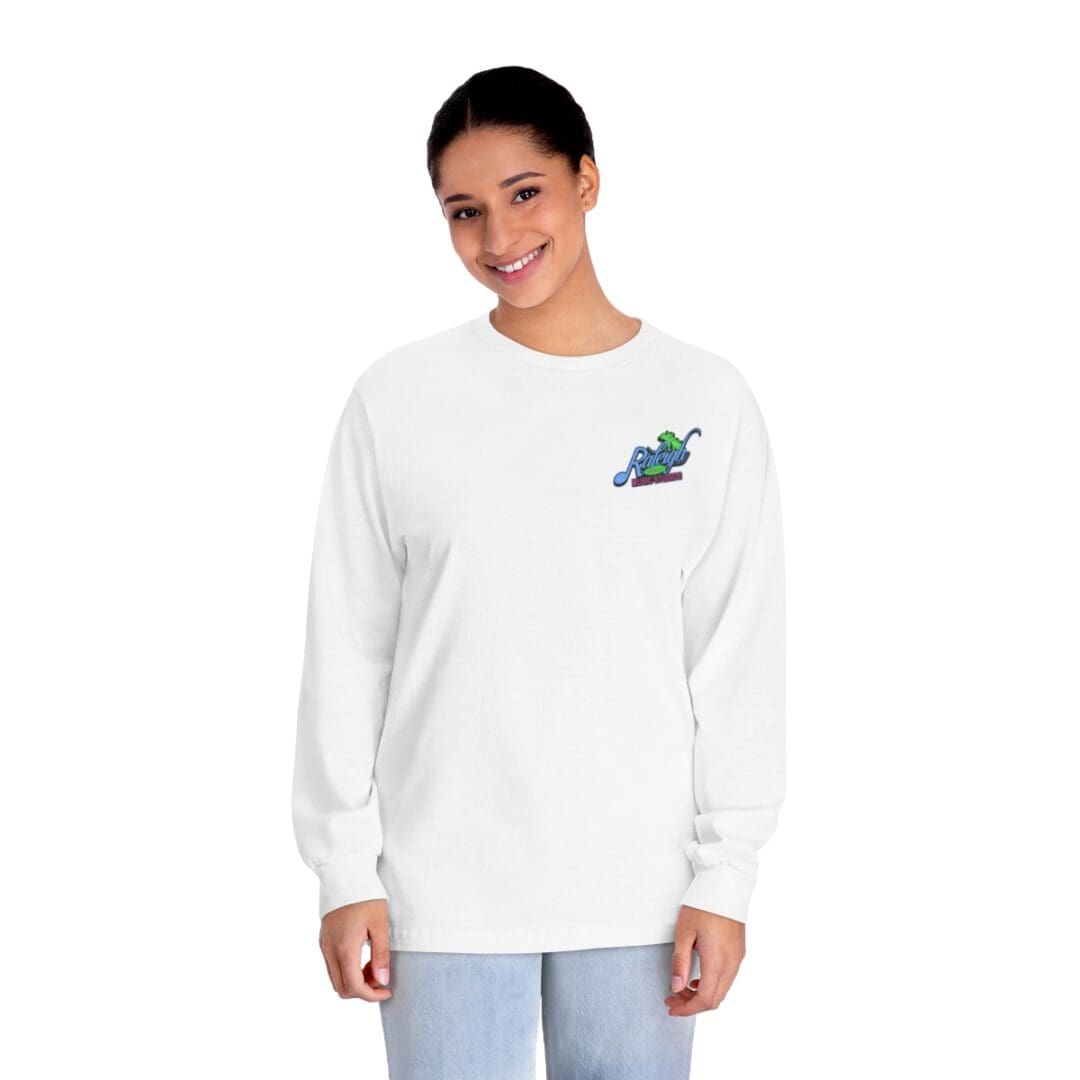 Woman in white long-sleeve shirt with logo.