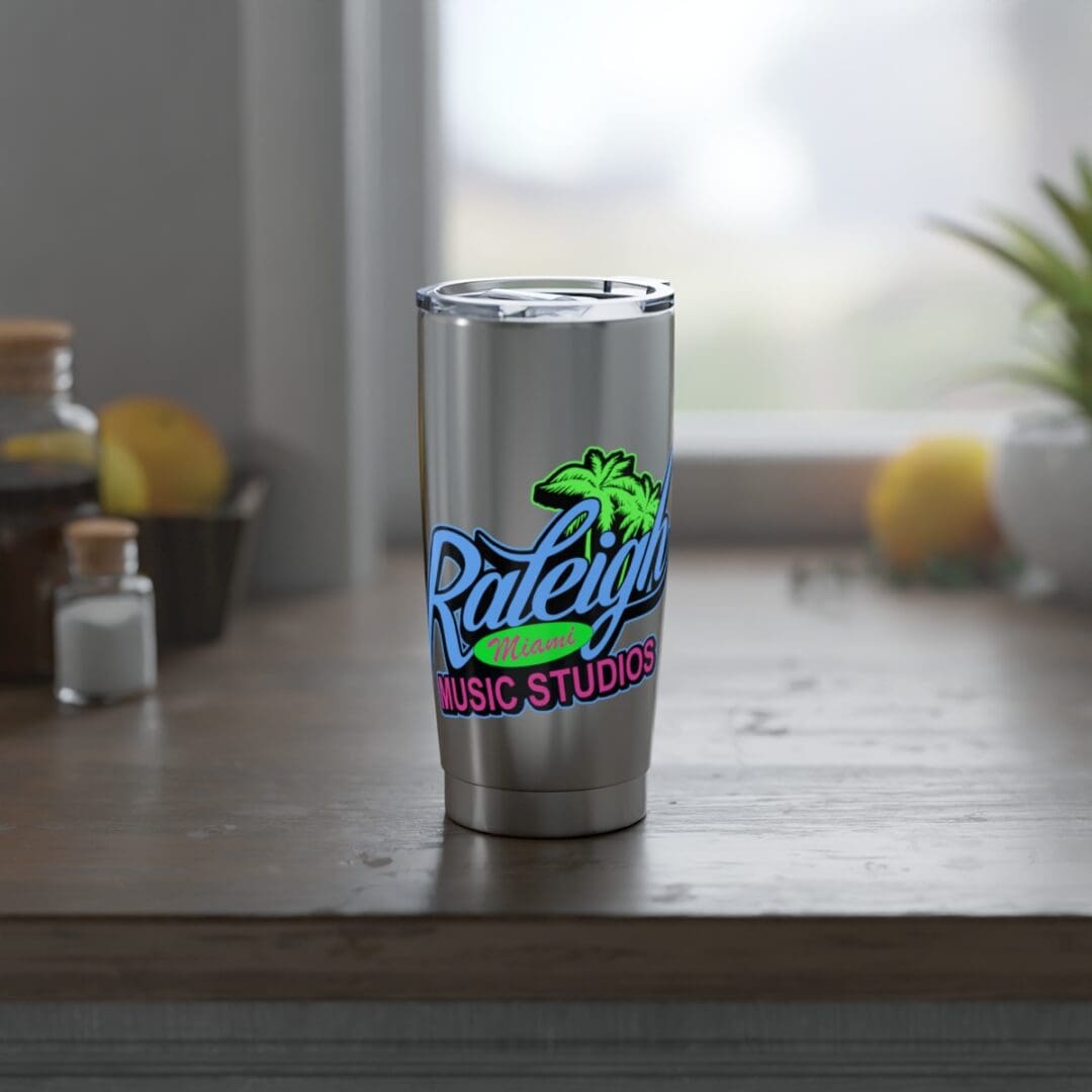 Stainless steel tumbler with colorful logo.